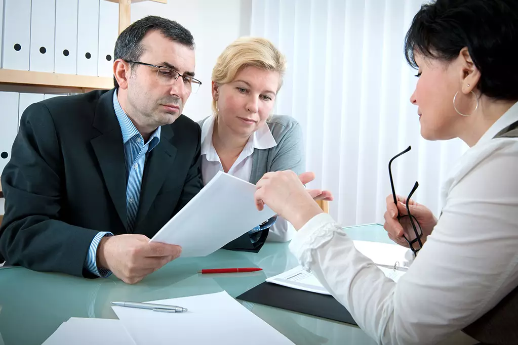 Couple meeting with financial advisor